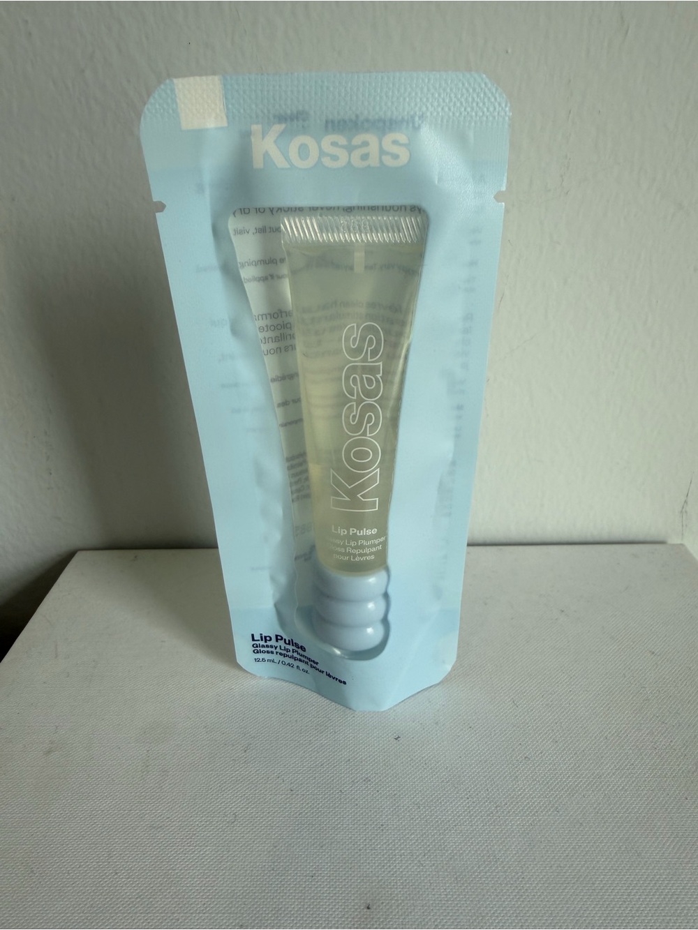 KOSAS Lip Pulse Glassy Lip Plumper Gloss in Unspoken